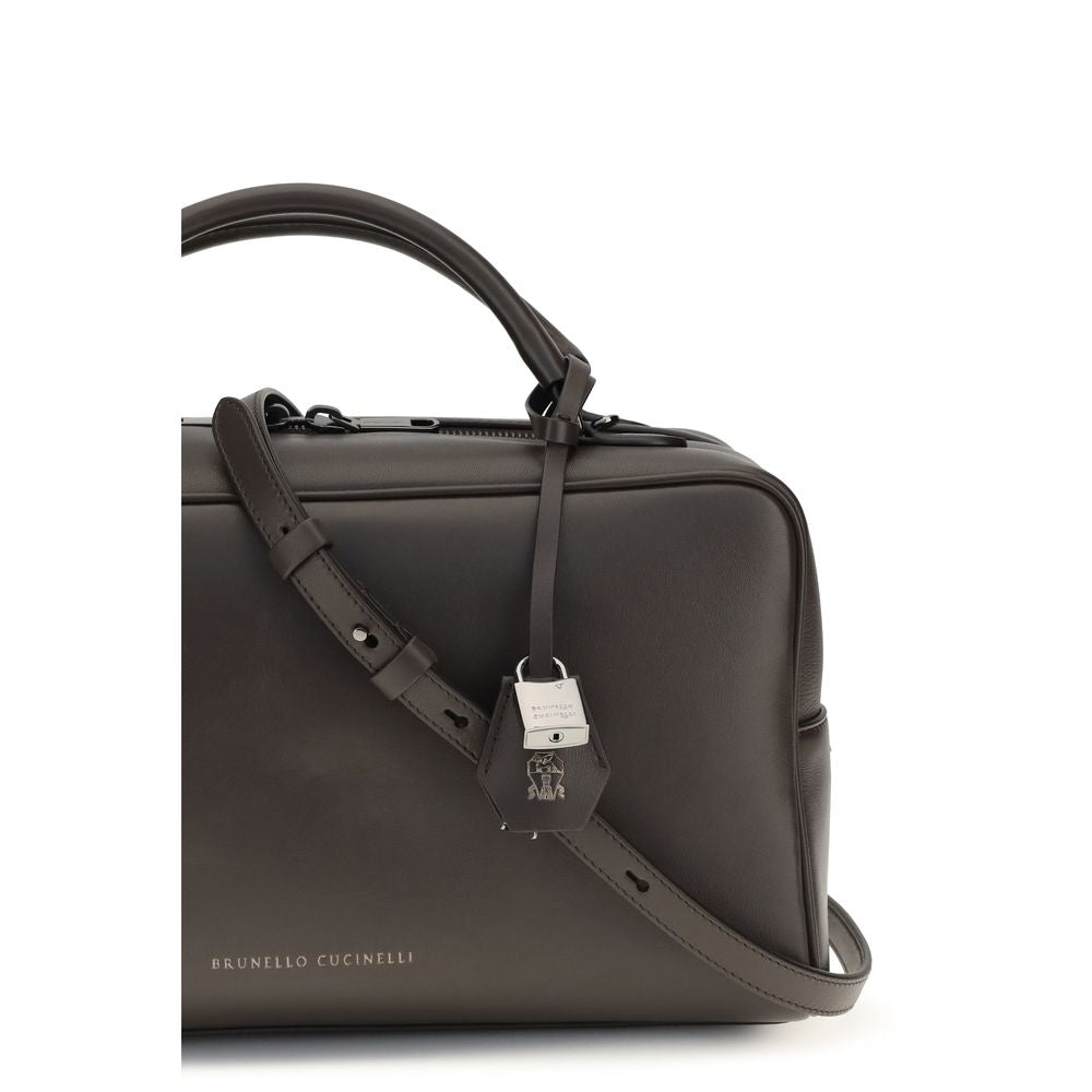Travel Belt Pouch Shoulder Bag by Brunello Cucinelli for women in bos taurus calf suede leather brown presents a versatile silhouette, showcasing a secure zipper and versatile built-in-compartments with versatile handle & adjustable-strap for a sophisticated look.