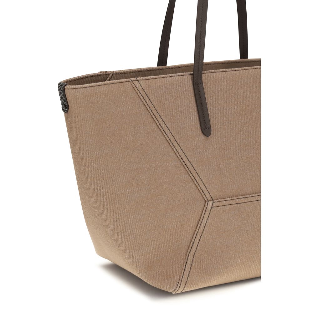 Shoulder Trapeze Handbag by Brunello Cucinelli for women in poly cotton canvas & leather beige presents a ornamental silhouette, showcasing a secure , ample , and versatile shoulder-strap & handle for a ornamental finish.