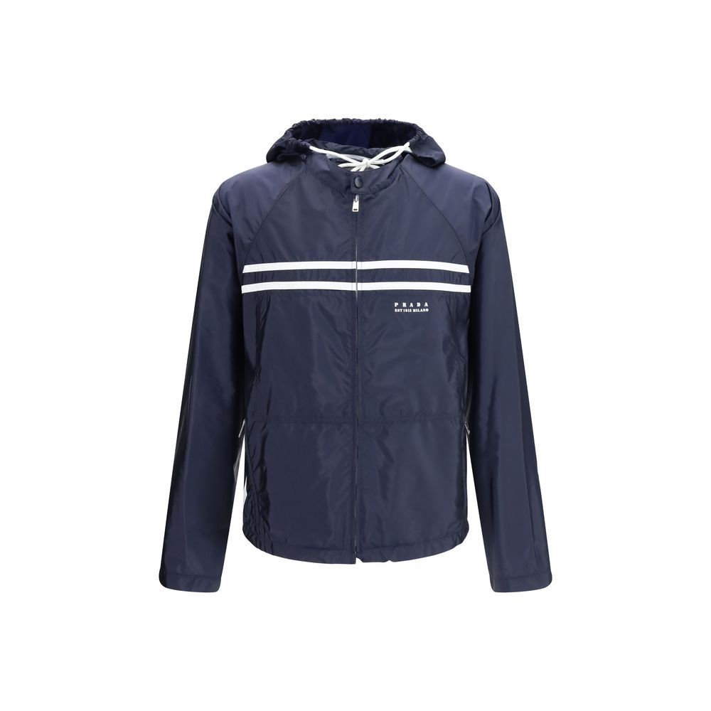 Hooded Windbreaker Jacket by Prada for men in nylon blue showcases a urban chic silhouette, detailed with a urban chic hooded neckline and functional pockets, hooded & windproof for a polished finish.