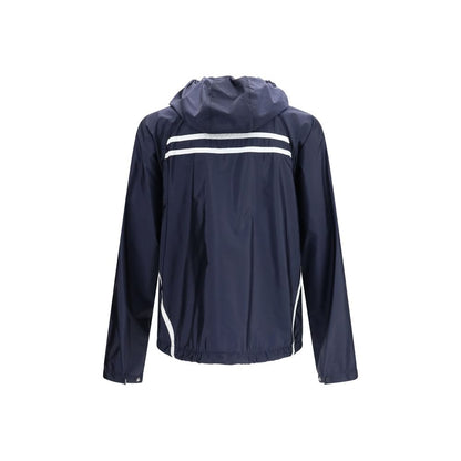 Hooded Windbreaker Jacket by Prada for men in nylon blue presents a resilient silhouette, artfully detailed with a sophisticated hooded neckline and functional pockets, hooded & windproof for a resilient finish.
