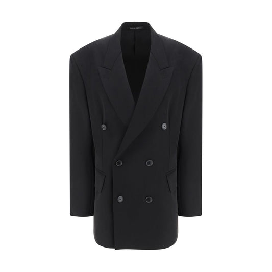 Blazer by Balenciaga for women in wool black showcases a polished silhouette, highlighted by a refined and polished for a sophisticated finish.