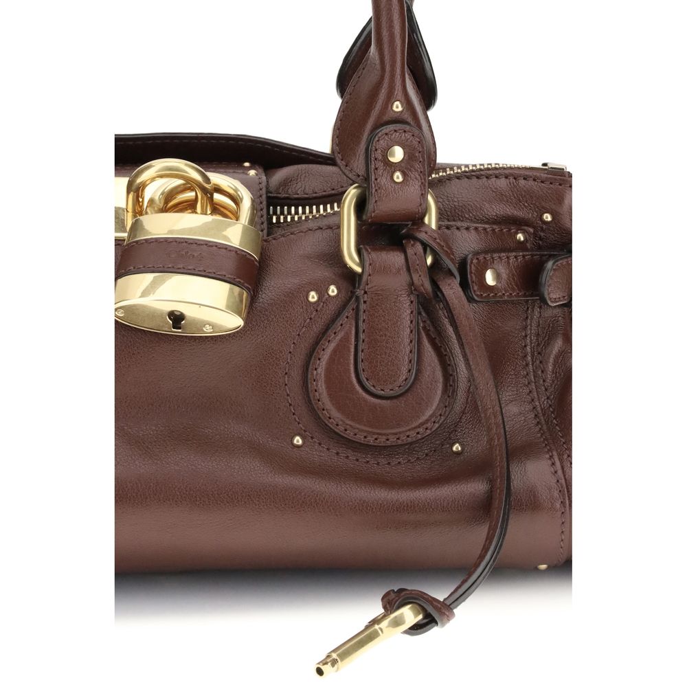 Shoulder Bag by Chloé for women in brown & monogram features a distinguished silhouette, showcasing a secure zipper and distinguished with versatile shoulder-strap for a distinguished finish.