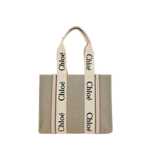 This Shoulder Handbag by Chloé for women in linen & leather and beige, signature & monogram presents a sculptural silhouette featuring a secure , ample , and versatile shoulder-strap, handle & adjustable-strap for a sculptural finish.