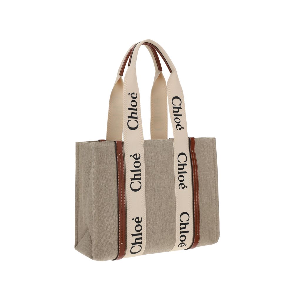 Shoulder Handbag by Chloé for women in linen & leather beige, signature, monogram & print features an refined silhouette, showcasing a secure , ample , and versatile shoulder-strap, handle & adjustable-strap for a sophisticated refined aesthetic.