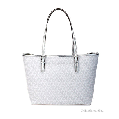 This Medium Travel Tote Bag by Michael Kors for women in synthetic polyurethane leather silver, white, patterned & signature features an jet-set Jet Set Travel Synthetic Polyurethane Leather Medium Tote Bag design with a secure hook, ample , and jet-set handle.