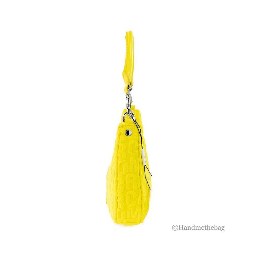 Small 2-in-1 Shoulder & Crossbody Crescent Hobo Bag by Marc Jacobs for women in polyester & nylon silver, patterned, signature & monogram features a statuesque silhouette, showcasing a secure zipper and statuesque with versatile crossbody-strap, shoulder-strap, adjustable-strap & detachable-strap for a statuesque finish.