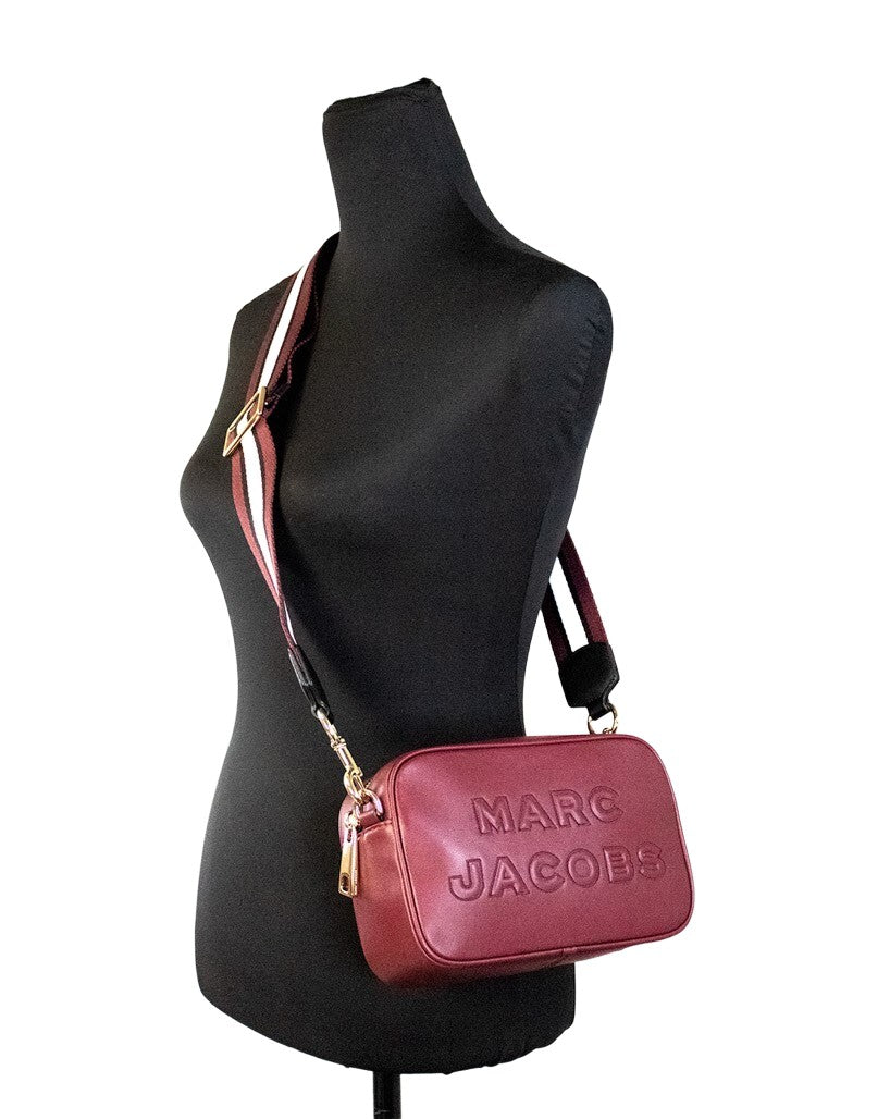 Crossbody Camera Handbag by Marc Jacobs for women in nylon & leather gold & multicolor presents a ornamental silhouette, showcasing a secure zipper, ample cardholder, and versatile crossbody-strap, adjustable-strap & detachable-strap for a ornamental finish.
