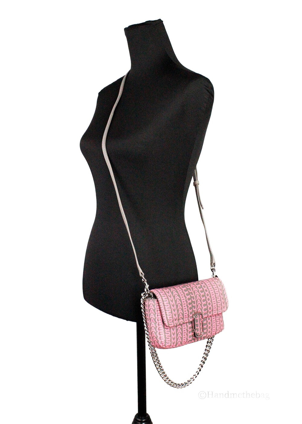 Mini 2-in-1 Shoulder & Crossbody Travel Handbag by Marc Jacobs for women in leather pink, silver, patterned & monogram features a multifaceted silhouette, showcasing a secure zipper & magnetic and multifaceted cardholder with versatile crossbody-strap, shoulder-strap & adjustable-strap for multifaceted style.