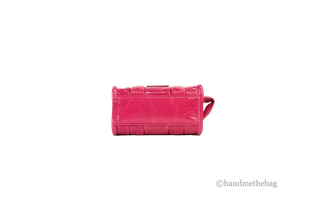 Micro 2-in-1 Shoulder & Crossbody Tote Handbag by Marc Jacobs for women in canvas & leather magenta, silver & patterned features an versatile silhouette, showcasing a secure zipper and versatile with versatile crossbody-strap, shoulder-strap, adjustable-strap & detachable-strap for a versatile finish.
