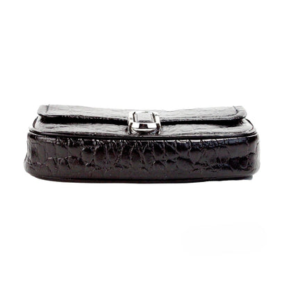 Mini 2-in-1 Shoulder & Crossbody Handbag by Marc Jacobs for women in embossed leather black & silver features a transformative elegance silhouette, showcasing a secure zipper & magnetic, organized cardholder, and versatile crossbody-strap, shoulder-strap, adjustable-strap & detachable-strap for a transformative elegance look.