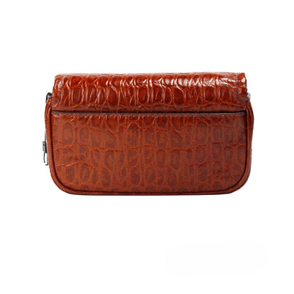 Mini 2-in-1 Shoulder & Crossbody Travel Handbag by Marc Jacobs for women in leather & metal animal, brown, silver, patterned & print features an multi-faceted design with a secure zipper & magnetic, ample cardholder, and versatile crossbody-strap, shoulder-strap, adjustable-strap & detachable-strap for a multi-faceted finish.