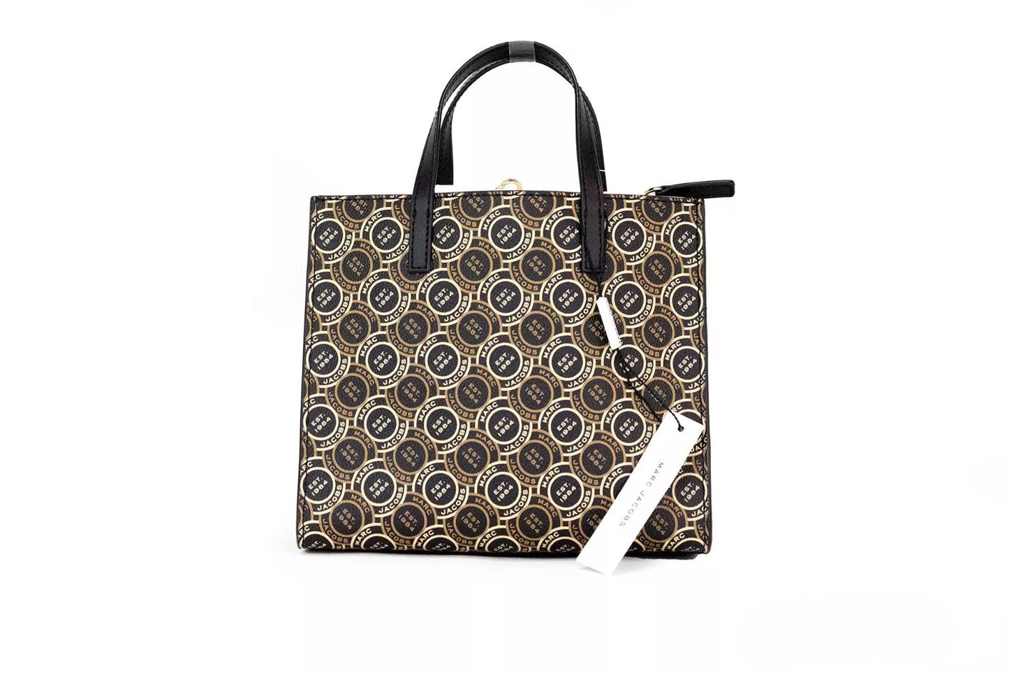 This Mini Crossbody Travel Tote Handbag by Marc Jacobs for women in faux patent leather and black, gold, orange & print presents a sculptural silhouette featuring a secure zipper, ample , and versatile crossbody-strap, adjustable-strap, detachable-strap & handle for a sculptural finish.
