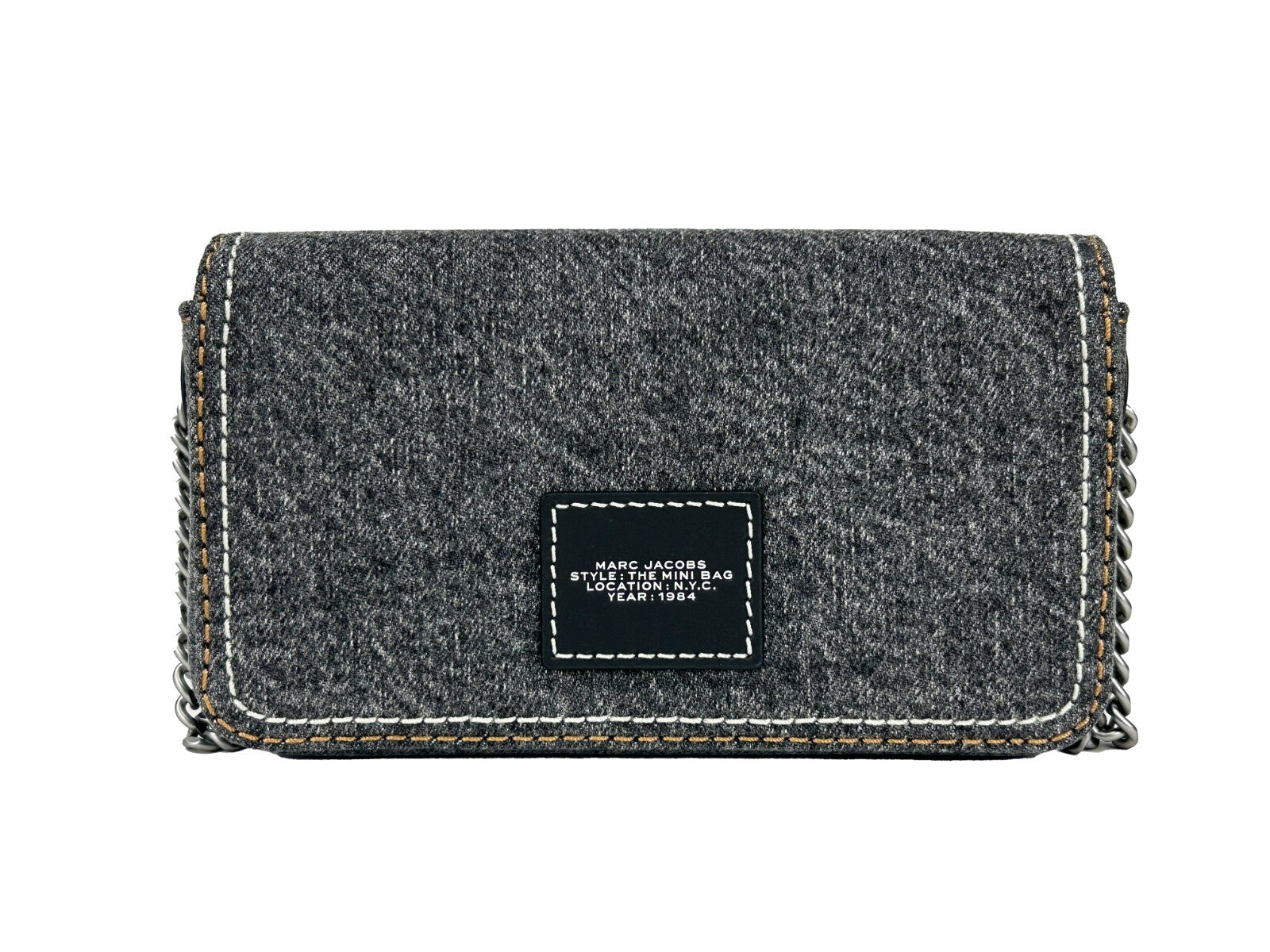 This Mini Crossbody Handbag by Marc Jacobs for women in stretch denim & viscose and black & silver presents a sculptural silhouette featuring a secure magnetic, ample , and versatile crossbody-strap for a sculptural finish.