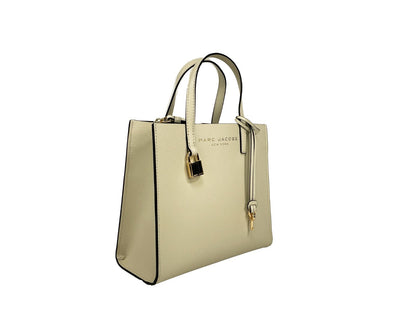 Mini Tote Bag by Marc Jacobs for women in canvas & leather black, gold, marshmallow & white features a jet-set sophisticated Canvas & Leather Mini Tote Bag design with a secure , ample , and versatile adjustable-strap, detachable-strap & handle for a jet-set sophisticated finish.