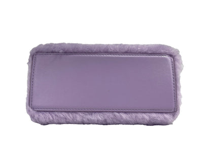 Mini Crossbody Travel Satchel Handbag by Marc Jacobs for women in faux leather lilac & silver features a transformative elegance silhouette, showcasing a secure magnetic, organized cardholder, and versatile crossbody-strap, handle, adjustable-strap & detachable-strap for a transformative elegance look.
