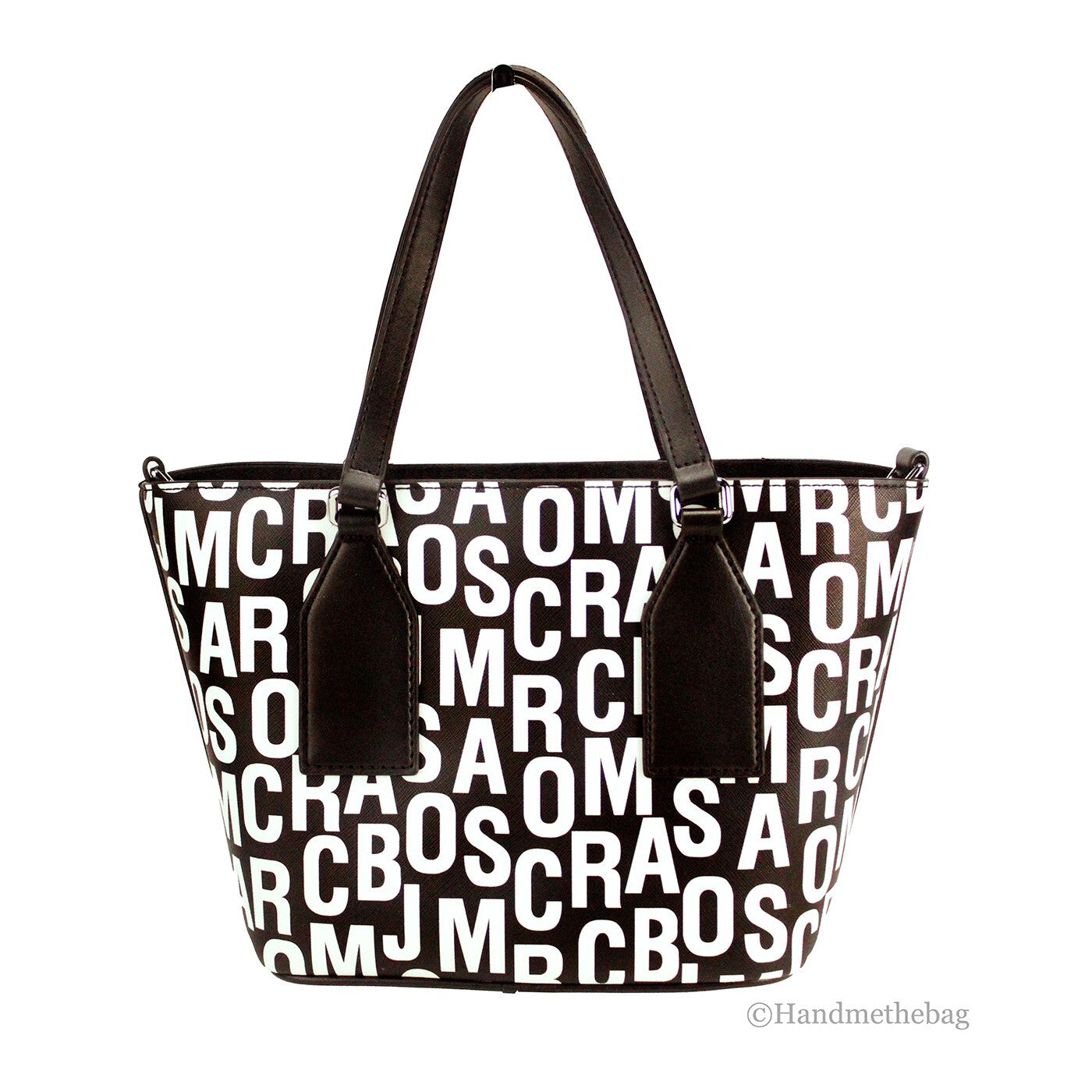 Small Crossbody Travel Tote Handbag by Marc Jacobs for women in leather & rubber black, silver, white, patterned, monogram & print features a transformative elegance silhouette, showcasing a secure zipper, organized , and versatile crossbody-strap, adjustable-strap, detachable-strap & handle for a transformative elegance look.