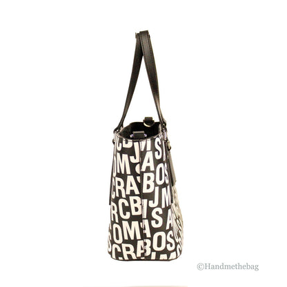 Small Crossbody Travel Tote Handbag by Marc Jacobs for women in leather & rubber black, silver, white, patterned, monogram & print showcases a versatile sophistication silhouette, featuring a secure zipper, versatile sophistication , and versatile crossbody-strap, adjustable-strap, detachable-strap & handle for a versatile sophistication finish.