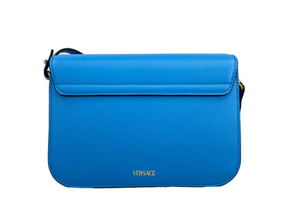 Small Crossbody Flap Handbag by Versace for women in leather blue & gold features an versatile silhouette, showcasing a secure flap & magnetic and versatile with versatile crossbody-strap, adjustable-strap & detachable-strap for a versatile finish.