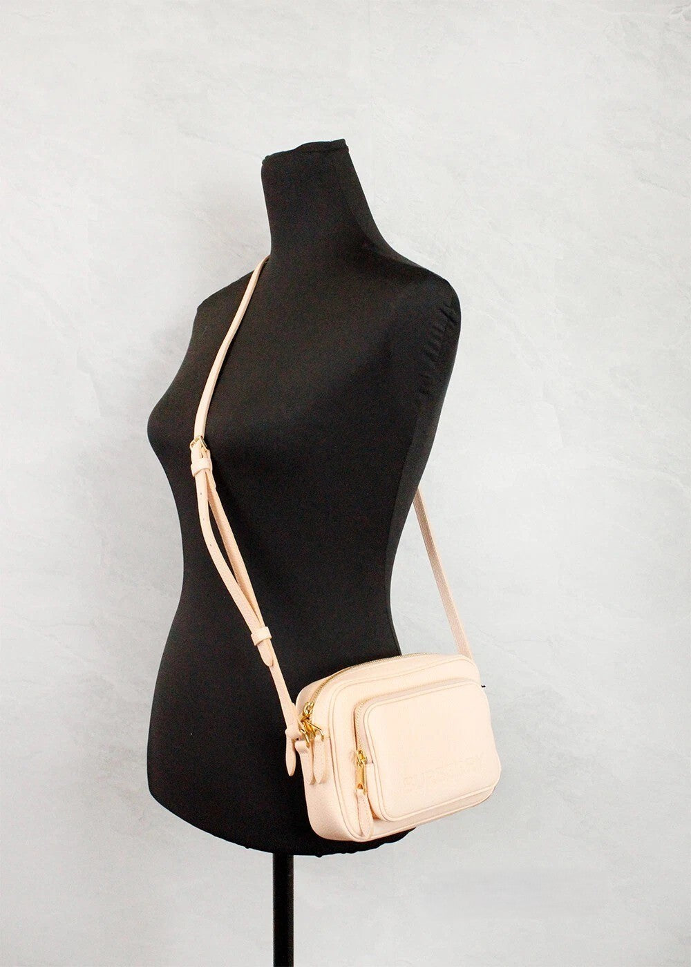 Small Crossbody Camera Handbag by Burberry for women in raffia & leather gold, peach & pink features a versatile chic silhouette, meticulously detailed with a secure zipper, ample , and versatile crossbody-strap & adjustable-strap.
