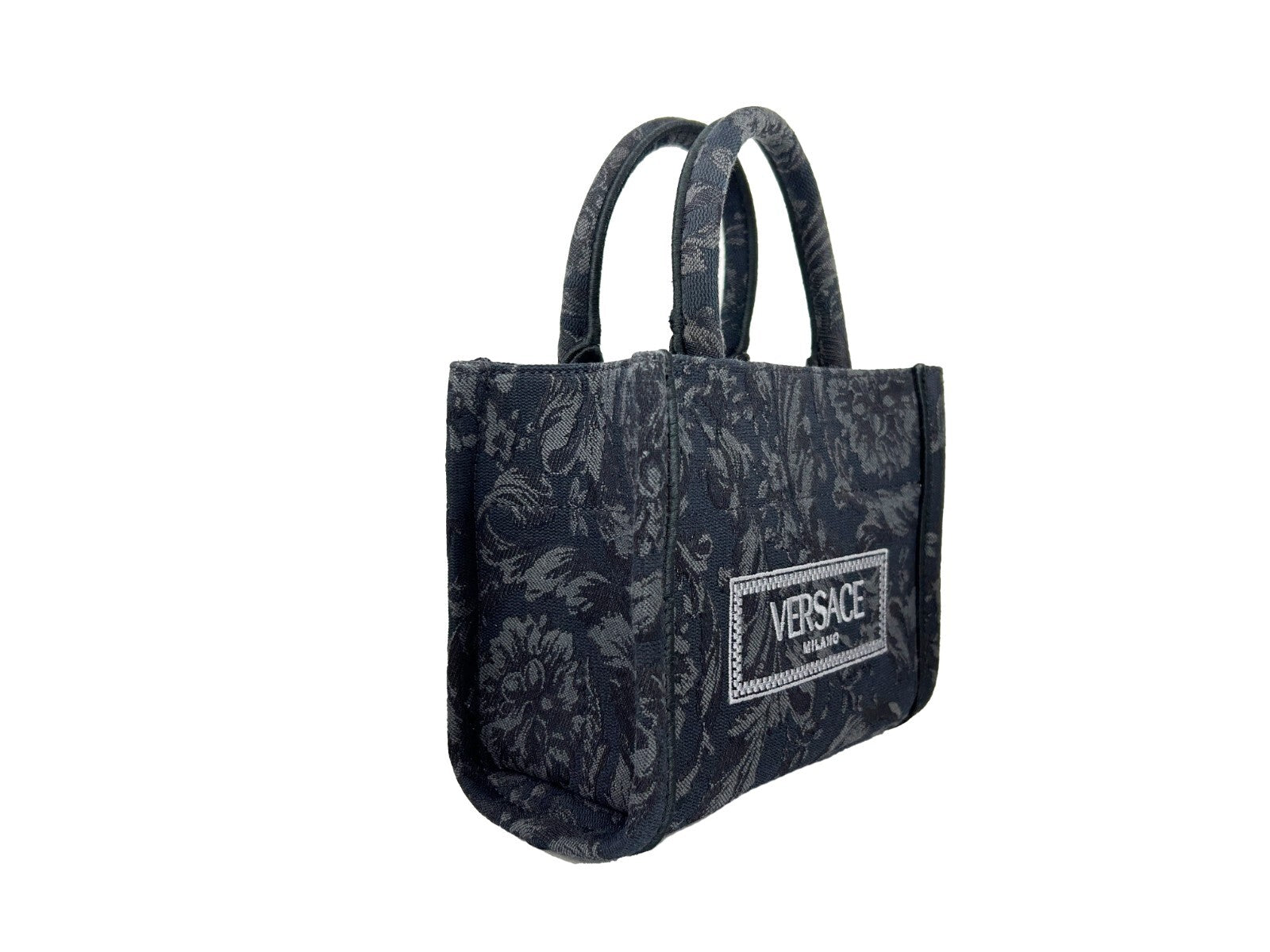 Small Travel Shopper Tote Handbag by Versace for women in calf & python leather black, gold & jacquard features a refined silhouette, showcasing a secure , organized , and versatile shoulder-strap, handle, adjustable-strap & detachable-strap for a refined finish.