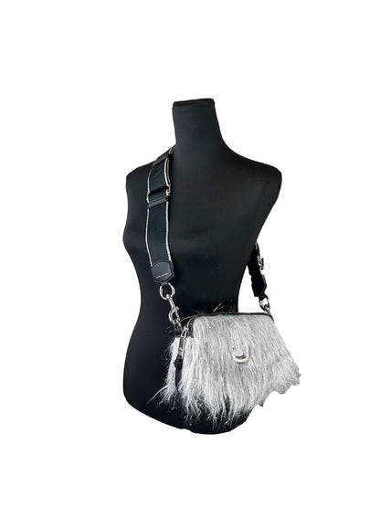 Small Crossbody Handbag by Marc Jacobs for women in leather & fur black & silver features a transformative sophistication silhouette, showcasing a secure zipper, ample , and versatile crossbody-strap, adjustable-strap & detachable-strap for a transformative sophistication look.