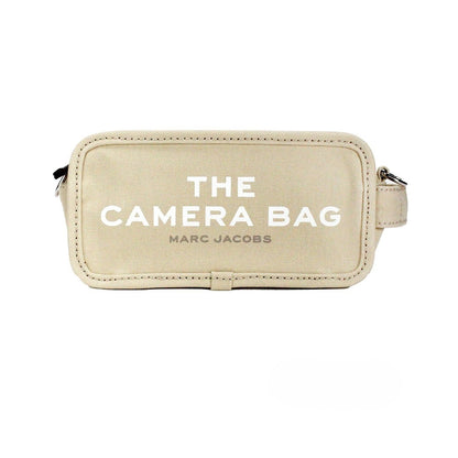 Small Travel Crossbody Camera Handbag by Marc Jacobs for women in stretch cotton modal canvas beige, black & silver features a transformative elegance silhouette, showcasing a secure zipper, organized , and versatile crossbody-strap, adjustable-strap & detachable-strap for a transformative elegance look.