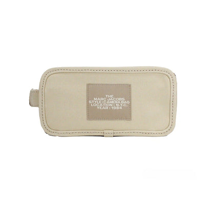 Small Travel Crossbody Camera Handbag by Marc Jacobs for women in stretch cotton modal canvas beige, black & silver showcases a versatile sophistication silhouette, featuring a secure zipper, versatile sophistication , and versatile crossbody-strap, adjustable-strap & detachable-strap for a versatile sophistication finish.