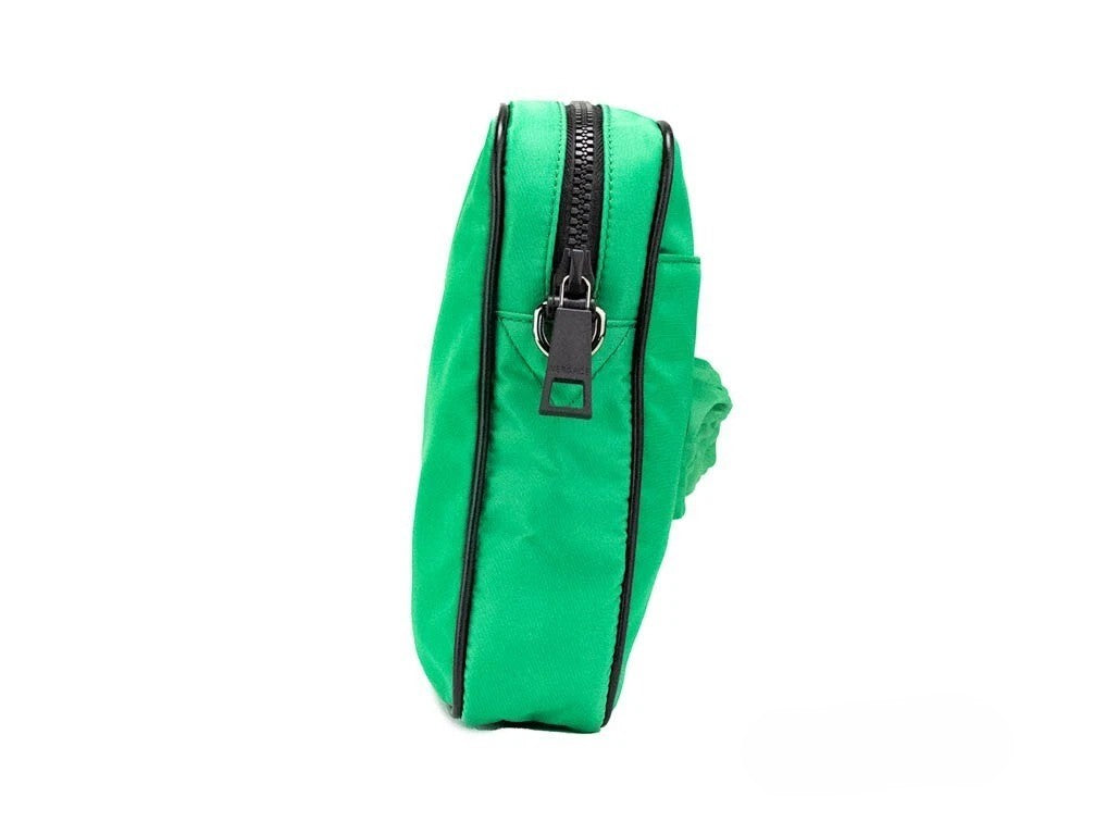 Small Crossbody Travel Messenger Handbag by Versace for women in nylon fabric black, green & patterned presents a ornamental silhouette, showcasing a secure zipper, ample cardholder, and versatile crossbody-strap, adjustable-strap & detachable-strap for a ornamental finish.