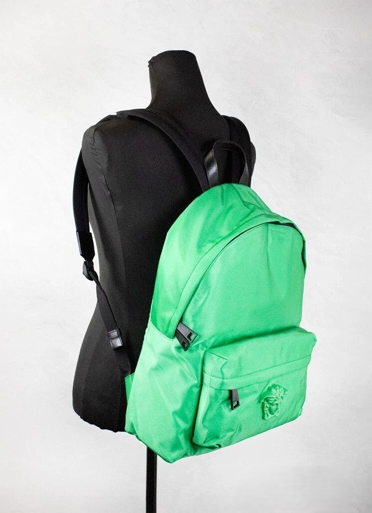 Large Backpack Shoulder Bag by Versace for women in nylon fabric black & green presents a statuesque silhouette, showcasing a secure zipper and statuesque laptop-compartment with versatile backpack-strap & adjustable-strap for a sophisticated look.