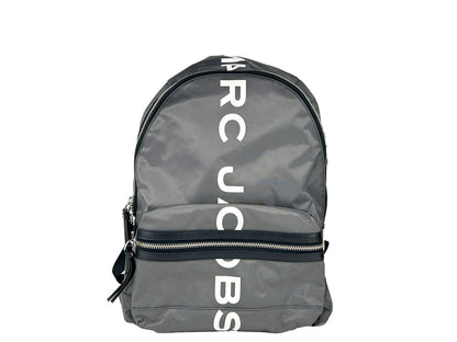 Travel Backpack by Marc Jacobs for women in nylon fabric gray & silver showcases an architectural Suspiria Nylon Fabric Travel Backpack design, featuring a secure zipper, ample , and architectural handle, backpack-strap & adjustable-strap for a sophisticated look.