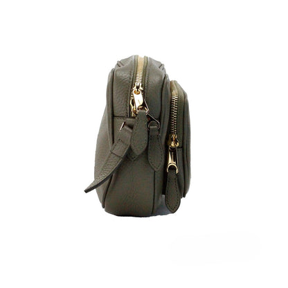 Small Crossbody Camera Handbag by Burberry for women in nylon & leather gold & green features a versatile chic silhouette, meticulously detailed with a secure zipper, ample , and versatile crossbody-strap & adjustable-strap.