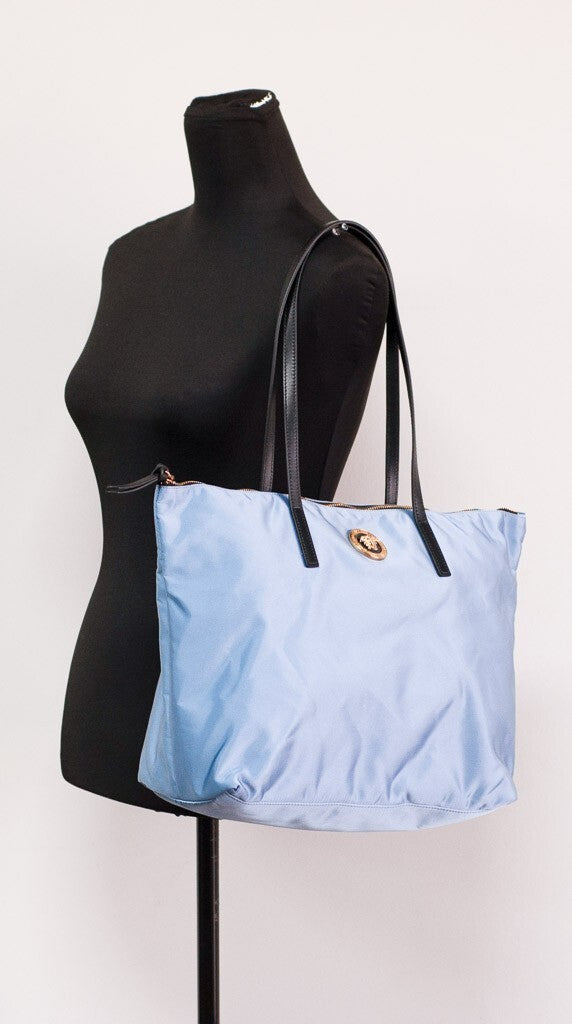 Medium Tote Handbag by Versace for women in calf & python leather blue & gold features a refined silhouette, showcasing a secure zipper, organized , and versatile handle for a refined finish.