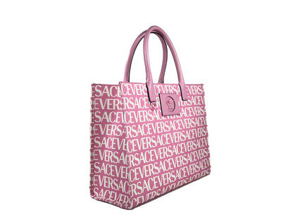 Large Tote Bag by Versace for women in cotton polyester canvas gold, pink & patterned features an jet-setting Medusa Cotton Polyester Canvas Large Tote Bag design with a secure , jet-setting cardholder, and versatile handle for a jet-setting look.