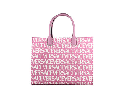 Large Tote Bag by Versace for women in cotton polyester canvas gold, pink & patterned showcases a statuesque Medusa Cotton Polyester Canvas Large Tote Bag design, featuring a secure , ample cardholder, and versatile handle for a statuesque finish.