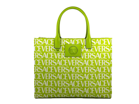 Large Travel Tote Bag by Versace for women in cotton polyester canvas gold, green & patterned features a jet-set Medusa Cotton Polyester Canvas Large Travel Tote Bag design, complete with a secure , ample cardholder, and versatile handle for a jet-set look.