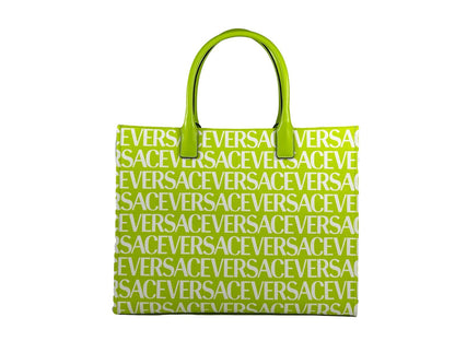 Large Travel Tote Bag by Versace for women in cotton polyester canvas gold, green & patterned showcases a statuesque Medusa Cotton Polyester Canvas Large Travel Tote Bag design, featuring a secure , ample cardholder, and versatile handle for a statuesque finish.