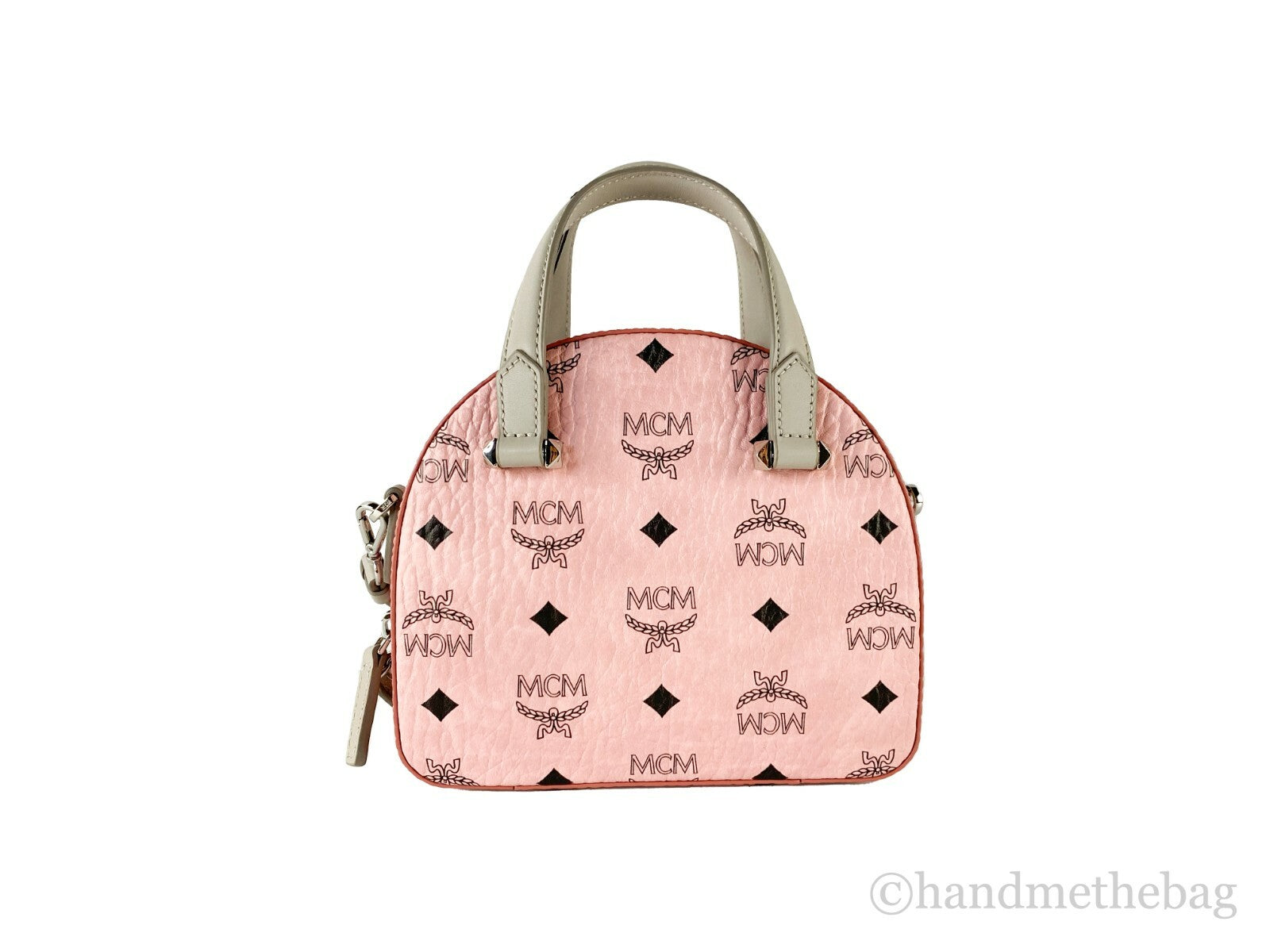 Compact Half Moon Crossbody Handbag by MCM for women in leather pink, silver & signature features a versatile chic silhouette, meticulously detailed with a secure zipper, ample cardholder, and versatile crossbody-strap, handle, adjustable-strap & detachable-strap.