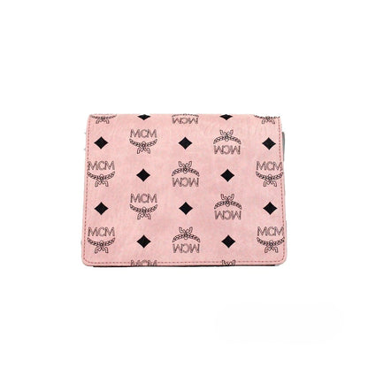 Mini Crossbody Flap Handbag by MCM for women in faux patent leather pink, silver, patterned & signature features a transformative sophistication silhouette, showcasing a secure flap & push-lock, ample , and versatile crossbody-strap, adjustable-strap & detachable-strap for a transformative sophistication look.