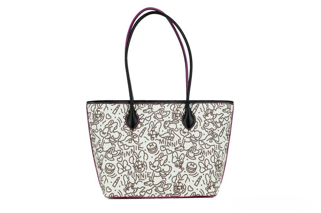 Medium Travel Tote Handbag by Dooney & Bourke for women in cotton polyester canvas gold presents a ornamental silhouette, showcasing a secure zipper & clip, ample , and versatile handle for a ornamental finish.