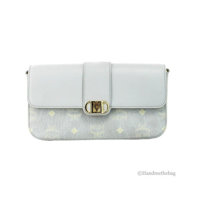 Small Crossbody Clutch Handbag by MCM for women in pebbled leather gold showcases a sculptural silhouette, featuring a secure zipper, ample cardholder, and versatile crossbody-strap, adjustable-strap & detachable-strap for a sculptural finish.