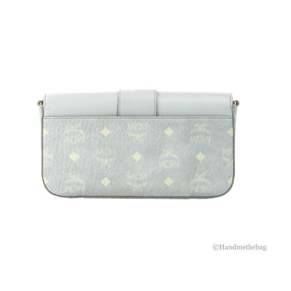 Small Crossbody Clutch Handbag by MCM for women in pebbled leather gold showcases a sculptural silhouette, featuring a secure zipper, ample cardholder, and versatile crossbody-strap, adjustable-strap & detachable-strap for a sculptural finish.