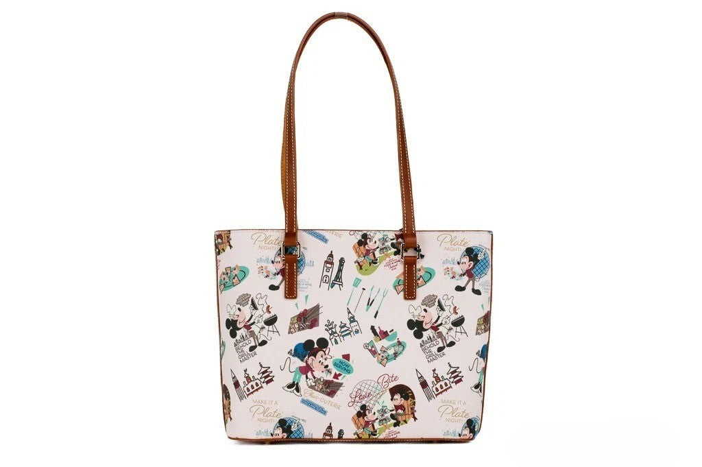 Travel Tote Bag by Dooney & Bourke for women in cotton polyester canvas gold & pink features a jet-set sophisticated Epcot International Food Wine Festival Cotton Polyester Canvas Travel Tote Bag design with a secure zipper, ample , and versatile handle for a jet-set sophisticated finish.