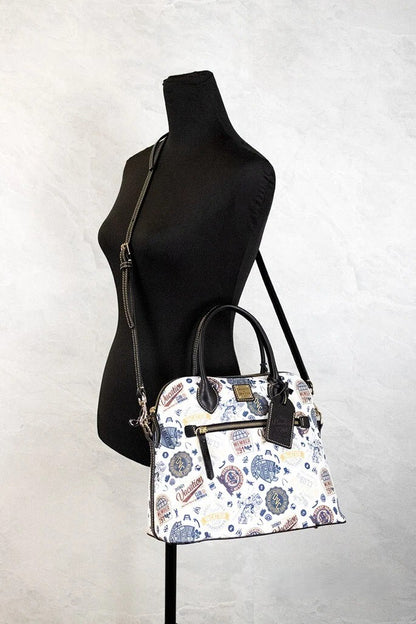 Crossbody Crescent Satchel Handbag by Dooney & Bourke for women in cotton polyester canvas gold features a transformative elegance silhouette, showcasing a secure zipper, organized , and versatile crossbody-strap, adjustable-strap, detachable-strap & handle for a transformative elegance look.