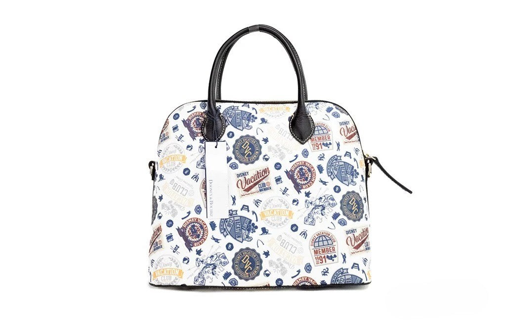 Crossbody Crescent Satchel Handbag by Dooney & Bourke for women in cotton polyester canvas gold showcases a versatile sophistication silhouette, featuring a secure zipper, versatile sophistication , and versatile crossbody-strap, adjustable-strap, detachable-strap & handle for a versatile sophistication finish.