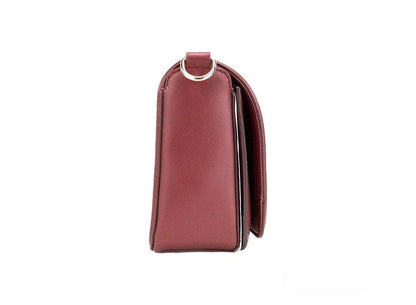 Medium Crossbody Flap Handbag by Marc Jacobs for women in leather & metal burgundy & gold features a multifaceted silhouette, showcasing a secure flap, zipper & magnetic and multifaceted with versatile crossbody-strap, adjustable-strap & detachable-strap for multifaceted style.