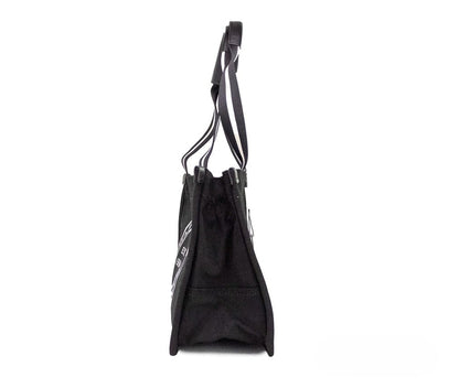 Medium Travel Tote Shoulder Bag by Marc Jacobs for women in canvas black & silver features a statuesque silhouette, showcasing a secure zipper and statuesque with versatile handle for a statuesque finish.