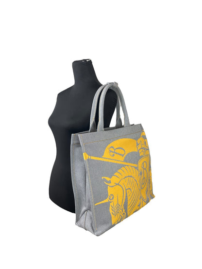 Pouch Tote Handbag by Burberry for women in faux leather & canvas gray, silver & patterned features a exquisite silhouette, showcasing a secure and exquisite coin-purse with versatile handle for a exquisite finish.