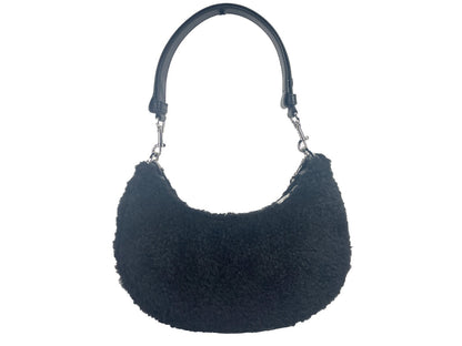 Medium Crossbody Travel Tote Handbag by Marc Jacobs for women in faux polyester fur black & silver features a exquisite silhouette, showcasing a secure zipper and exquisite with versatile crossbody-strap, detachable-strap & handle for a exquisite finish.