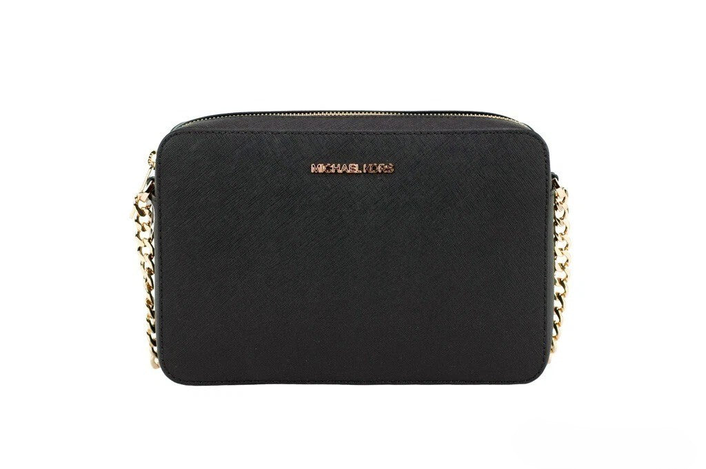 Crossbody Handbag by Michael Kors for women in leather & rubber black & gold features an multi-faceted design with a secure zipper, ample , and versatile crossbody-strap & adjustable-strap for a multi-faceted finish.