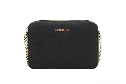 Crossbody Handbag by Michael Kors for women in leather & rubber black & gold features an multi-faceted design with a secure zipper, ample , and versatile crossbody-strap & adjustable-strap for a multi-faceted finish.